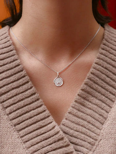 Pendentif Médaille amour Augis ronde Plus qu'hier moins que demain or blanc diamant rubis 58 Facettes J495