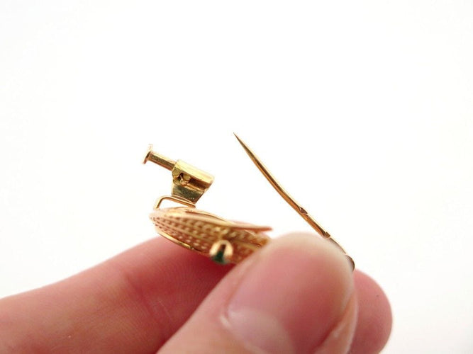 Broche vintage broche epingle tourbillon torsadee or emeraudes 58 Facettes 260447