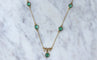 Collier Collier noeud or et cabochons émeraude 58 Facettes