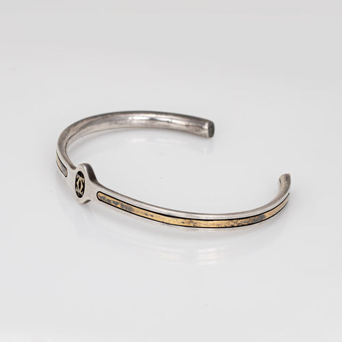 Bracelet Bracelet manchette Cartier des années 70 en argent sterling et or 18 carats, logo CC vintage signé 58 Facettes G13936