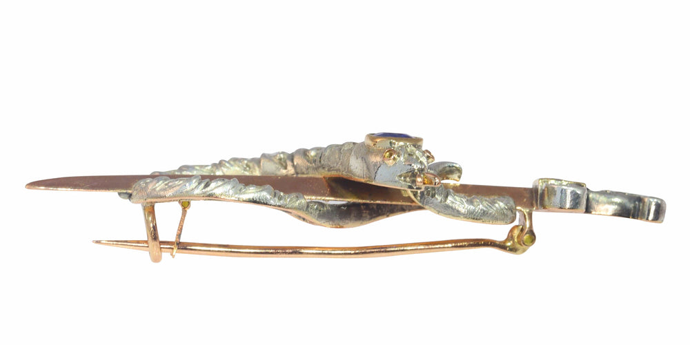 Broche Broche antique en or, diamant et saphir, serpent enroulé autour d'une épée ou d'un poignard 58 Facettes 22297-0136