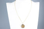 Collier Collier Pendentif Augis 18 carats Or jaune  + qu'hier - que demain  0.06ct Rubis 58 Facettes CLAUGIS-107