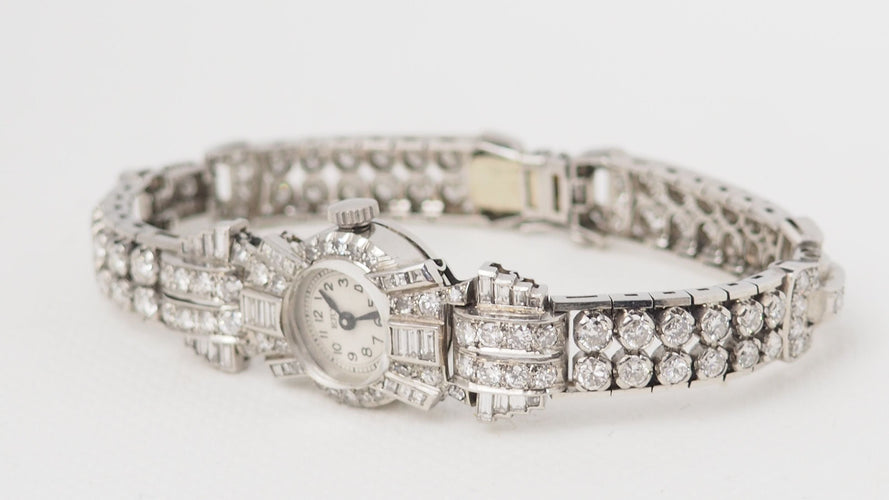 Montre 16cm Montre Ery en or platine et diamants 58 Facettes 32306