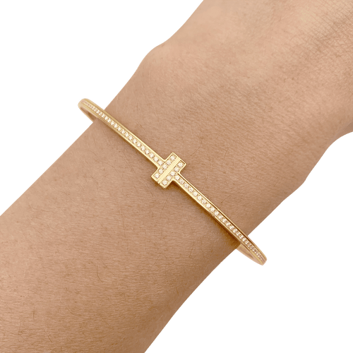 Bracelet Bracelet Tiffany & Co., "Tiffany T", or jaune, diamants. 58 Facettes 34364