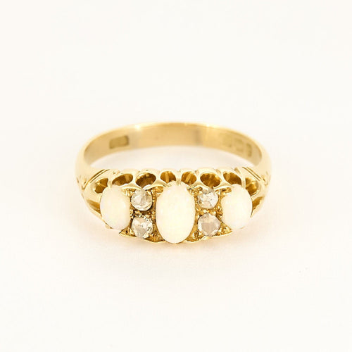 Bague 58 Bague type jarretière en or jaune, opales et diamants roses 58 Facettes MAR0975