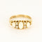 Bague 58 Bague type jarretière en or jaune, opales et diamants roses 58 Facettes MAR0975