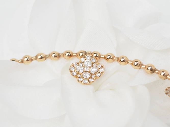 Collier Collier boules rigide et trèfles en or rose et diamants 58 Facettes 33100