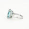 Bague 56 Bague or gris ornée d'une aigue marine 58 Facettes GU72