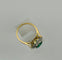 Bague 50 Bague de style Art Déco en or jaune et platine, avec une émeraude centrale et des diamants 58 Facettes 50243