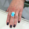 Bague Bague en or blanc avec turquoise et onyx 58 Facettes