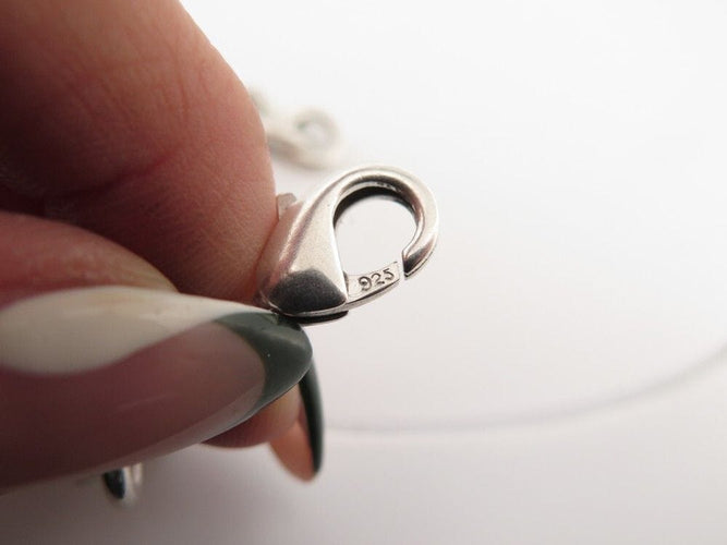 Bracelet bracelet TIFFANY & CO chaine a breloques charms tour eiffel en argent 58 Facettes 259081