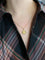 Pendentif PERROUD Pendentif vintage signe du zodiaque Gémeaux or jaune 58 Facettes 1099.25