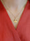 Pendentif Médaille amour Augis ronde rayons Plus qu'hier moins que demain or jaune rubis 58 Facettes J553