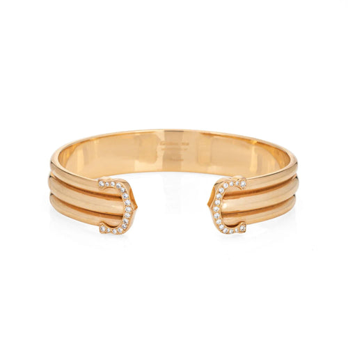 Bracelet Cartier - Bracelet manchette Vintage Double C de Cartier Or jaune Diamants 58 Facettes G13514