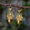 Boucles d'oreilles Boucles d'oreilles cannetille en or 14 carats, style néo-étrusque, représentant une tête de bélier et une amphore. 58 Facettes A20042