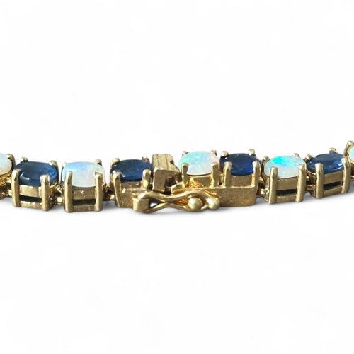 Bracelet Bracelet or jaune serti de saphirs et opales 58 Facettes 344