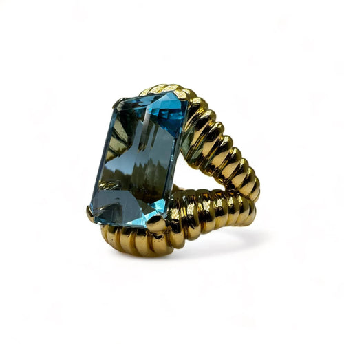 Bague Bague vintage en or jaune montée d’une Aigue-Marine Santa Maria de 17carats. 58 Facettes
