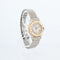 Montre Cartier - Montre Santos Octagone cadran crème chiffres romains acier et or jaune 58 Facettes