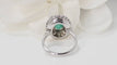 Bague 51 Bague marguerite en or blanc, émeraude et diamants 58 Facettes F4947