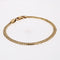 Bracelet Bracelet en or occasion gourmette aplatie 58 Facettes 24-330
