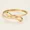 Bracelet Bracelet "Serpent" en or jaune, rubis et émeraudes 58 Facettes BIA1213