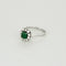 Bague 57 Bague Marguerite or gris, émeraude et diamants 58 Facettes CAN1063