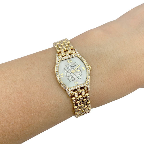 Montre Montre Cartier "Tortue" or jaune, diamants, nacre. 58 Facettes 33639