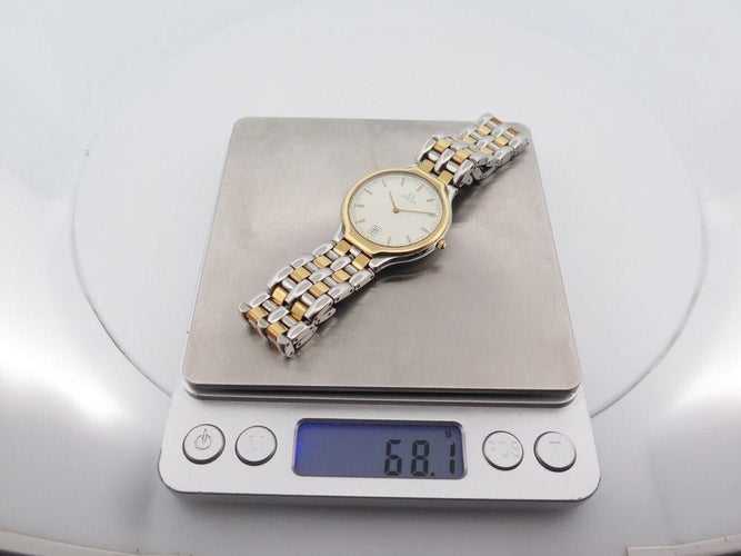 Montre vintage montre OMEGA deville symbol quartz en or et acier 58 Facettes 260174