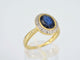 Bague 54 Bague entourage en or avec diamants et saphir 58 Facettes 2142
