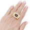 Bague 54 Bague "tank", deux tons d'or, grenat et diamants. 58 Facettes 34577