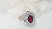 Bague 56 Bague Entourage En Or Blanc, Rubis Et Diamants 58 Facettes F4385