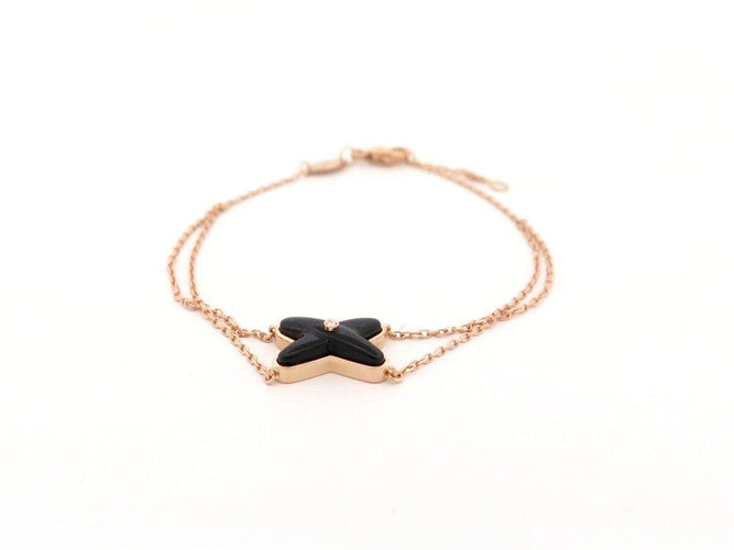 bracelet CHAUMET jeux de liens onyx diamant en or rose 18k 15-17 cm
