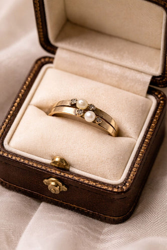 Bague Bague Art Déco en or jaune ornée d'un diamant et d'une perle 58 Facettes 50115