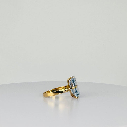 Bague Bague en or jaune 14 carats avec topaze bleue taille émeraude de 2 carats 58 Facettes 2508099