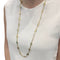Collier Collier CHAUMET en or jaune et émail « plique-à-jour ». 58 Facettes 34785