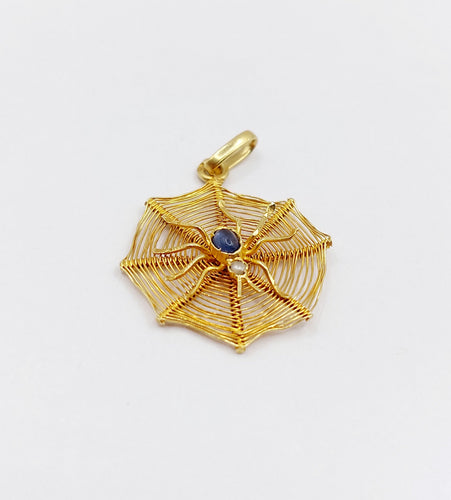 Pendentif vintage or jaune araignée sur sa toile, pierre bleue et perle 58 Facettes A06223