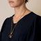 Collier Chaîne et pendentif cube en or jaune et tourmalines vertes 58 Facettes MONTE0164