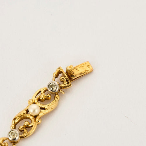 Bracelet Bracelet or jaune et gris, perles et diamants 58 Facettes ENG10572