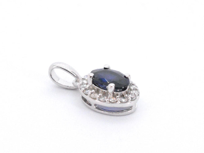 Pendentif Pendentif entourage en or blanc avec diamants et saphir 58 Facettes 2016