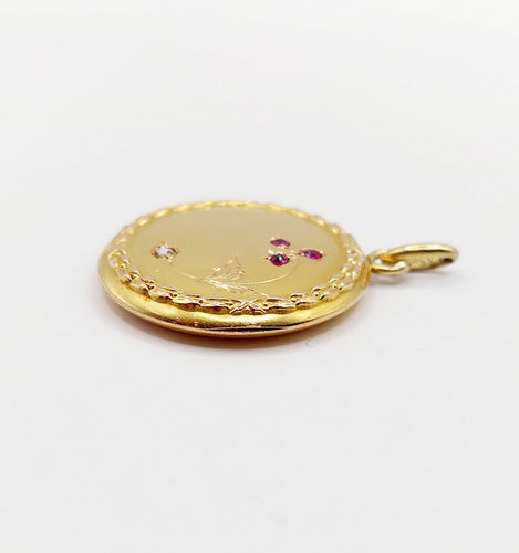 Pendentif Pendentif porte-photo antique fleur en or 18k avec diamant et rubis vers 1910 58 Facettes A06431