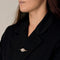 Broche Broche en or jaune, or gris, rubis et diamants 58 Facettes BLO015831