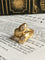 Bague 51 Bague ancienne en or jaune 18K représentant deux serpents 58 Facettes