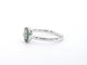 Bague 54 Bague en or blanc avec diamants et émeraudes 58 Facettes 2344