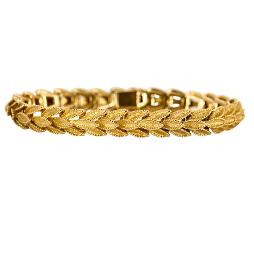 Bracelet Bracelet or jaune à motif de feuilles 58 Facettes CHAL0241