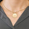 Pendentif AUGIS - Médaille d'Amour - or jaune, et rubis de synthèse 58 Facettes ENG105183