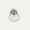 Bague 50 Bague marguerite en or blanc, émeraude et diamants 58 Facettes B250523