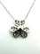 Collier VAN CLEEF & ARPELS. Collection "Mini Frivole", collier or blanc 18K et diamants (full set) 58 Facettes