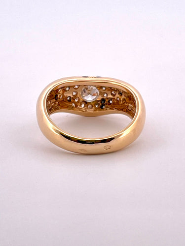 Bague 56 Bague ondulée en or jaune, diamants 58 Facettes