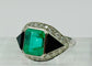 Bague 52 Bague Art Déco en platine ornée d'émeraudes, d'onyx et de diamants 58 Facettes 50306