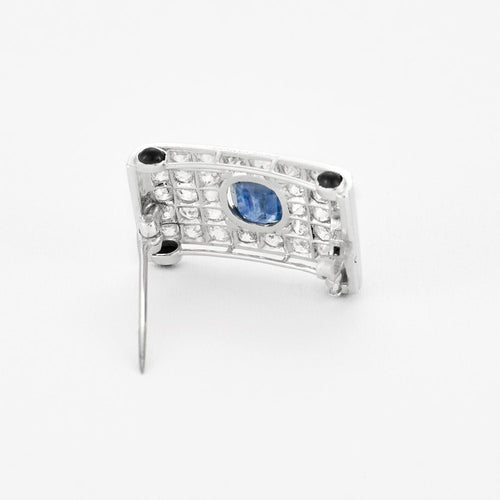 Broche CARTIER - Broche Art déco en platine, saphirs, diamants et cabochons d'onyx 58 Facettes 58FC10